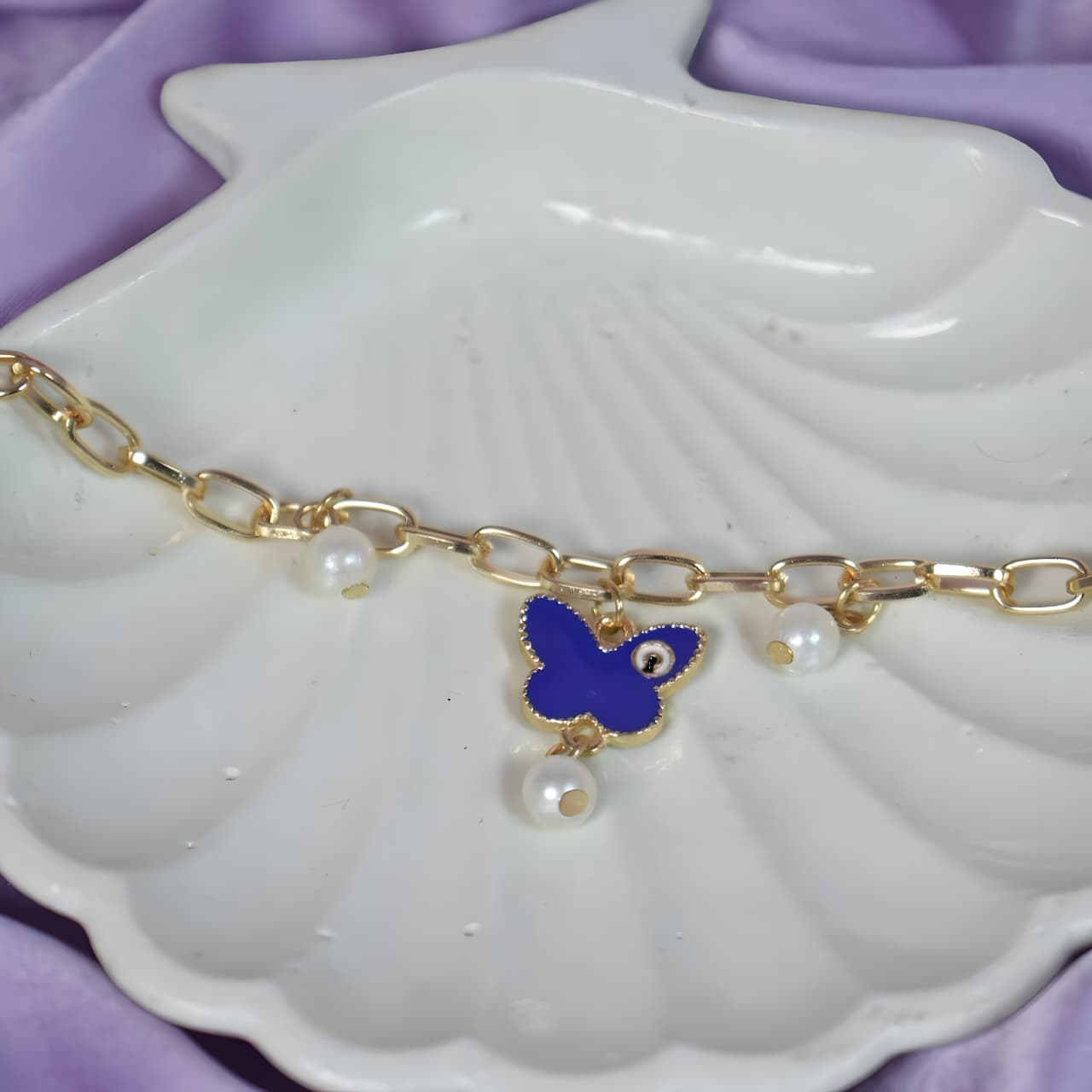 Butterfly Painted Evil Eye Bracelet by Gleamy
