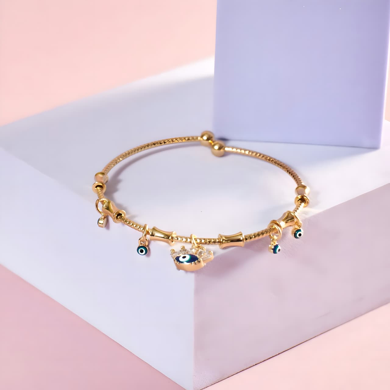 Chic Evil Eye Tassel Bangle by Gleamy
